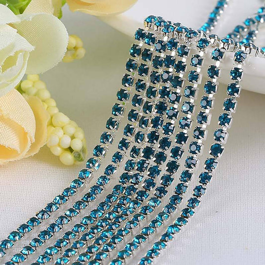 Banda argintie cu cristale albastru verzui 2 mm