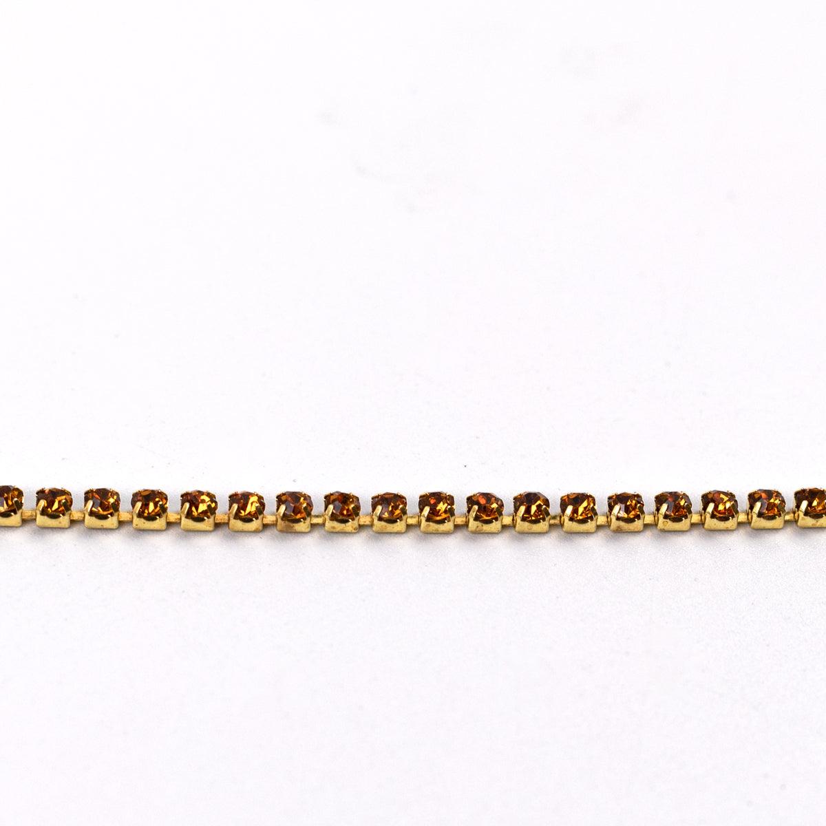 Banda aurie cu cristale aurii 2 mm